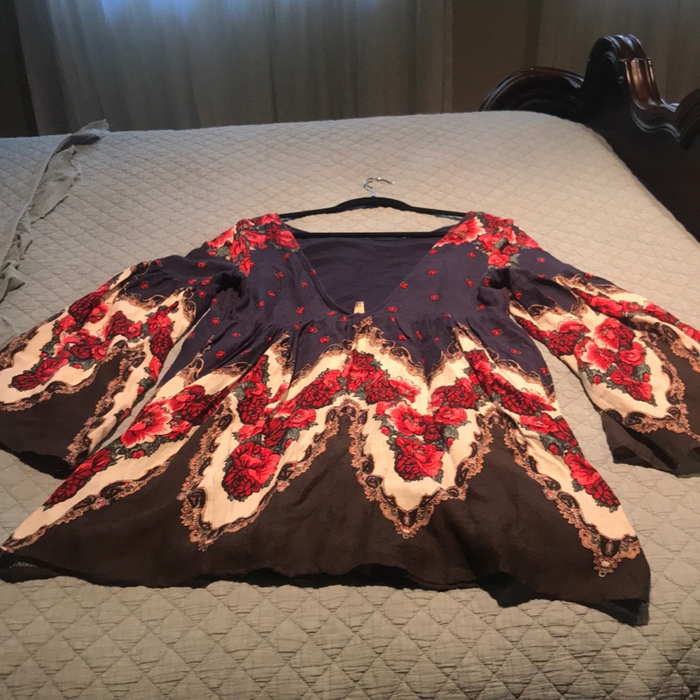 Free People multi colored tunic.   Never worn